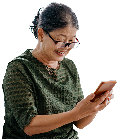 Woman smiling while looking at smartphone