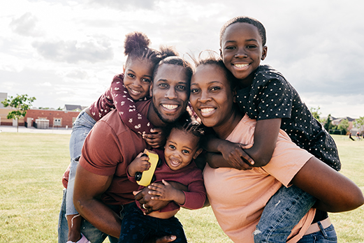 Smiling family of five